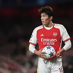 Takehiro Tomiyasu in Action: Arsenal vs Sevilla - UEFA Champions League 2023/24