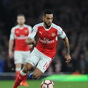 Theo Walcott in Action: Thrilling Arsenal Quarter-Final Clash against Lincoln City