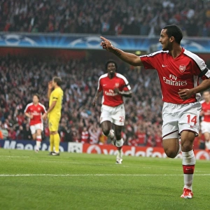 Theo Walcott celebrates scoring the 1st Arsenal goal