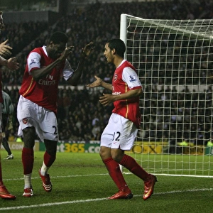 Theo Walcott celebrates scoring the 4th Arsenal goal with Emmanuel Adebayor