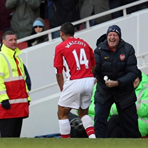 Theo Walcott celebrates scoring Arsenals 2nd goal with Paul Johnson