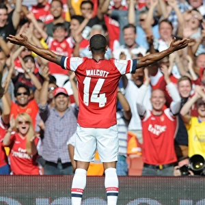Theo Walcott celebrates scoring Arsenals goal. Arsenal 1: 2 Galatasaray. Emirates Cup Day Two