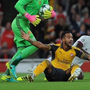 Theo Walcott vs. Eder Balanta: A Controversial Penalty Call in Arsenal's UEFA Champions League Clash with FC Basel