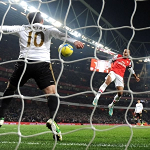 Theo Walcott's Shot Thwarted by Danny Graham in FA Cup Third Round Replay
