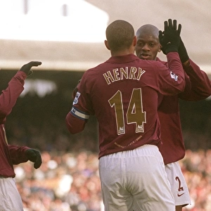 Thierry Henry celebrates scoring Arsenals 1st goal with Abou Diaby