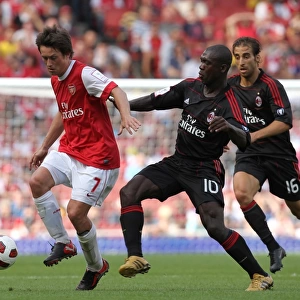 Tomas Rosicky (Arsenal) Clarence Seedorf (Milan). Arsenal 1: 1 AC Milan