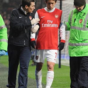 Tomas Rosicky is treated by Arsenla doctor Gary O Driscoll. Arsenal 5: 0 Leyton Orient