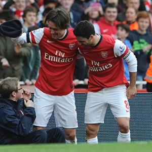Triumphant Moment: Rosicky and Arteta Celebrate Arsenal's Third Goal vs. Sunderland (2014)