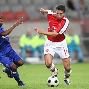 Van Persie's Brilliance: Arsenal's 3-2 Victory Over Ajax and Anita at Amsterdam Tournament