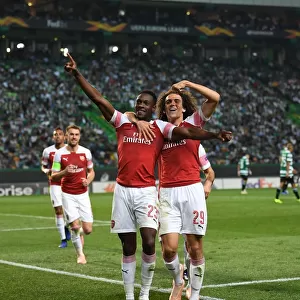 Welbeck and Guendouzi Celebrate Arsenal's Goal Against Sporting CP in Europa League