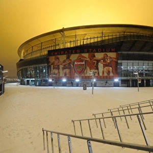 Winter's Battle at Emirates: Arsenal vs. Blackburn Rovers Amidst a Snow-Covered Stadium