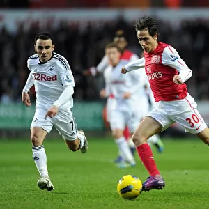 Yossi Benayoun (Arsenal) Leon Britton (Swansea). Swansea City 3: 2 Arsenal