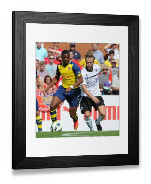 Framed Print : Chuba Akpom (Arsenal) Ben Nunn (Boreham Wood). Boreham Wood 0: 2 Arsenal. Pre Season Friendly Framed Print : Chuba Akpom (Arsenal) Ben Nunn (Boreham Wood). Boreham Wood 0: 2 Arsenal. Pre Season Friendly