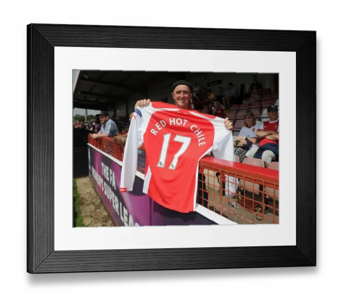 Framed Print : Arsenal fan. Boreham Wood 0: 2 Arsenal. Pre Season Friendly. Meadow Park. Borehamwood Framed Print : Arsenal fan. Boreham Wood 0: 2 Arsenal. Pre Season Friendly. Meadow Park. Borehamwood