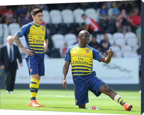 Hector Bellerin and Benik Afobe (Arsenal) warms up before the match. Boreham Wood 0: 2 Arsenal