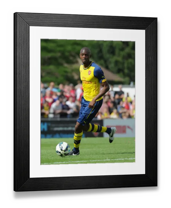 Framed Print : Abou Diaby in Action: Arsenal's Pre-Season Clash against Boreham Wood