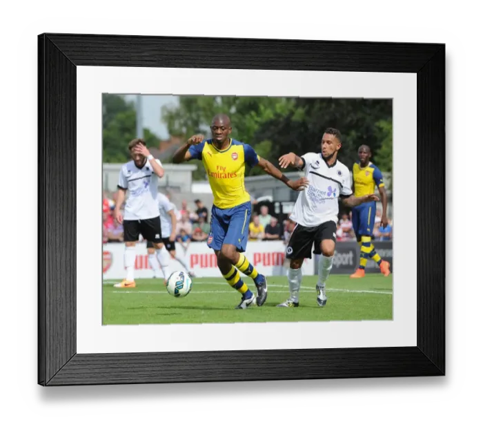 Framed Print : Abou Diaby vs Ben Nunn: Clash in Arsenal's Pre-Season Friendly against Boreham Wood Framed Print : Abou Diaby vs Ben Nunn: Clash in Arsenal's Pre-Season Friendly against Boreham Wood