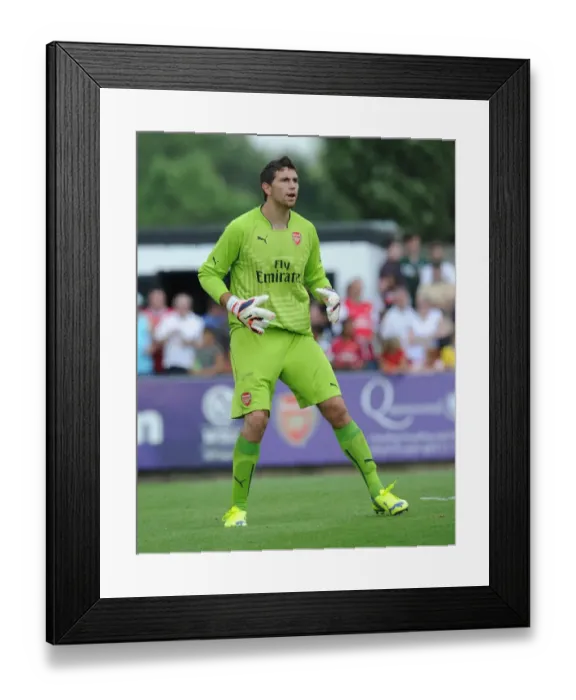 Framed Print : Arsenal's Damien Martinez in Pre-Season Action against Boreham Wood