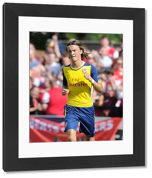 Kris Olsson celebrates scoring Arsenals 1st goal. Boreham Wood 0: 2 Arsenal. Pre Season Friendly