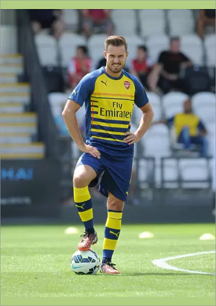 Aaron Ramsey (Arsenal) warms up before the match. Boreham Wood 0: 2 Arsenal. Pre Season Friendly