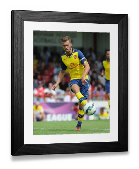 Framed Print : Aaron Ramsey (Arsenal). Boreham Wood 0: 2 Arsenal. Pre Season Friendly. Meadow Park Framed Print : Aaron Ramsey (Arsenal). Boreham Wood 0: 2 Arsenal. Pre Season Friendly. Meadow Park