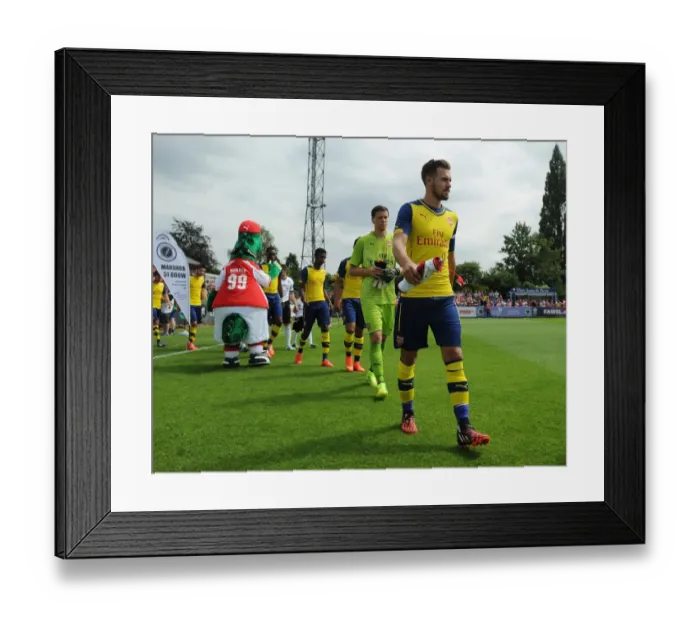 Framed Print : Aaron Ramsey Leads Arsenal Out in Pre-Season Friendly Against Borehamwood Framed Print : Aaron Ramsey Leads Arsenal Out in Pre-Season Friendly Against Borehamwood