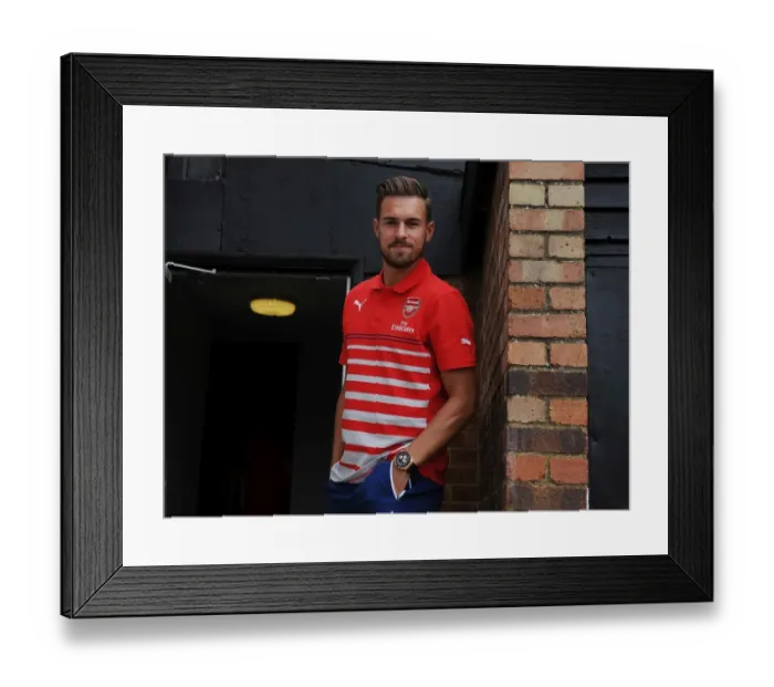Framed Print : Arsenal's Aaron Ramsey Prepares for Action in Borehamwood Friendly