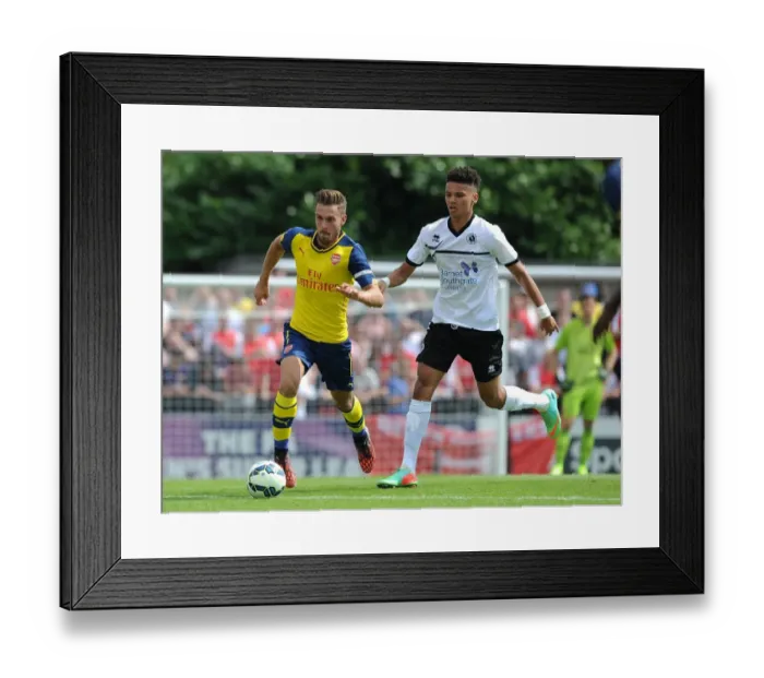Framed Print : Aaron Ramsey Breaks Past Lee Angol: Borehamwood vs Arsenal Pre-Season Clash Framed Print : Aaron Ramsey Breaks Past Lee Angol: Borehamwood vs Arsenal Pre-Season Clash