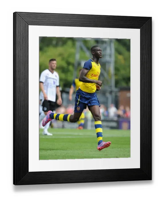 Framed Print : Yaya Sanogo in Action: Arsenal's Pre-Season Victory over Boreham Wood