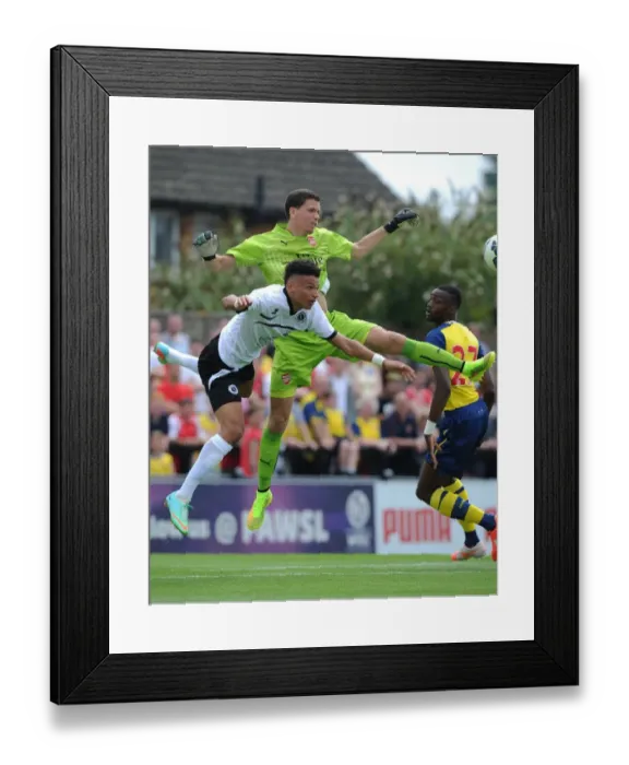 Framed Print : Wojciech Szczesny vs. Lee Angol: Clash in Arsenal's Pre-Season Friendly against Boreham Wood Framed Print : Wojciech Szczesny vs. Lee Angol: Clash in Arsenal's Pre-Season Friendly against Boreham Wood