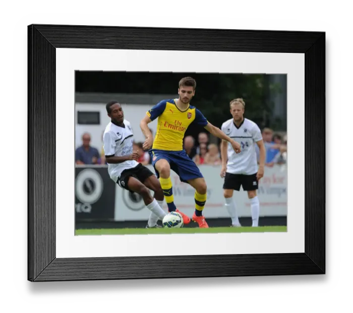 Framed Print : Jon Toral Outmaneuvers Ricky Shakes in Arsenal's Pre-Season Victory over Borehamwood
