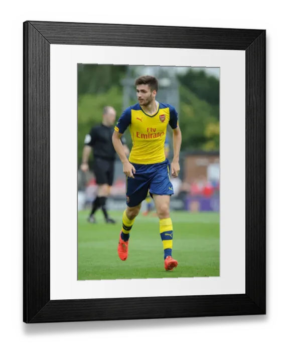 Framed Print : Jon Toral in Action: Arsenal's Pre-Season Battle at Boreham Wood Framed Print : Jon Toral in Action: Arsenal's Pre-Season Battle at Boreham Wood