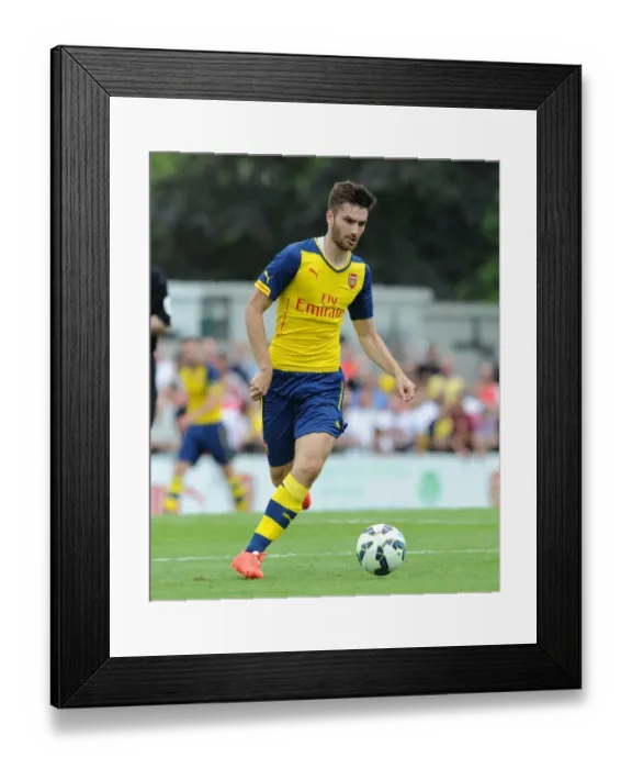 Framed Print : Jon Toral in Action: Arsenal's Pre-Season Clash at Boreham Wood