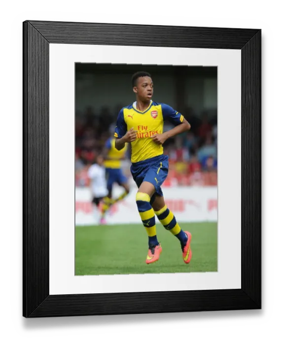 Framed Print : Chris Willock in Action: Arsenal's Pre-Season Battle at Boreham Wood Framed Print : Chris Willock in Action: Arsenal's Pre-Season Battle at Boreham Wood