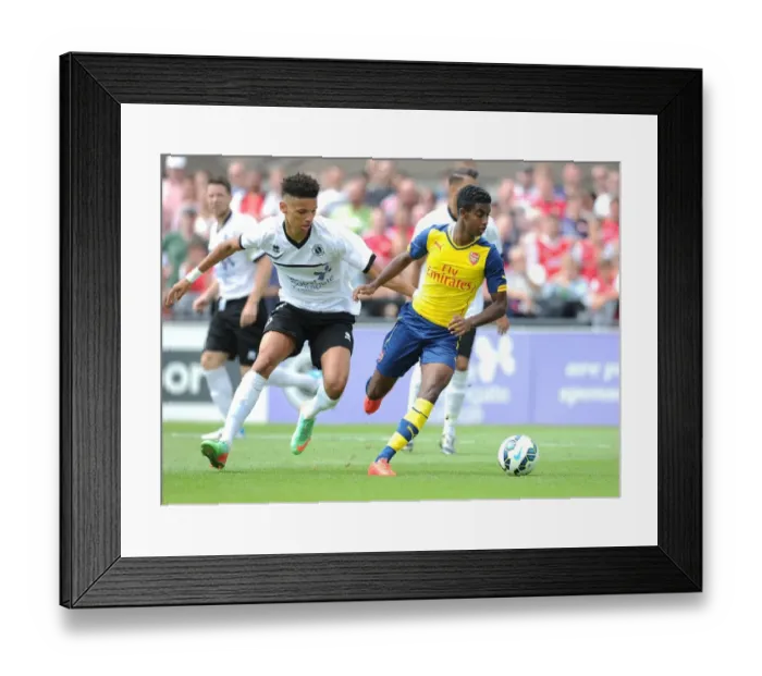 Framed Print : Gedion Zelalem vs. Lee Angol: Clash in Arsenal's Pre-Season Friendly against Boreham Wood Framed Print : Gedion Zelalem vs. Lee Angol: Clash in Arsenal's Pre-Season Friendly against Boreham Wood