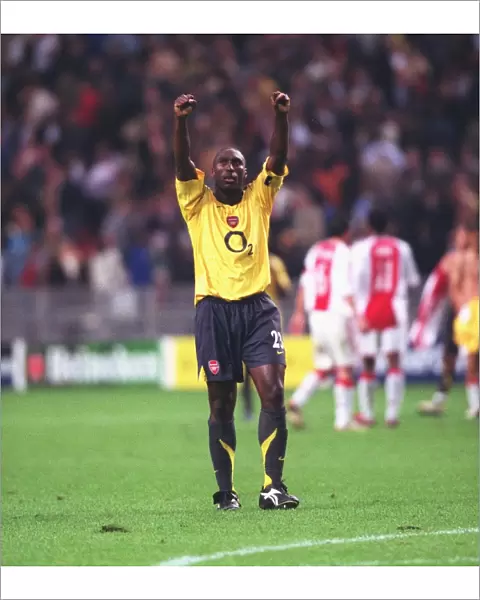 Arsenal captain Sol Campbell celebrates after the match