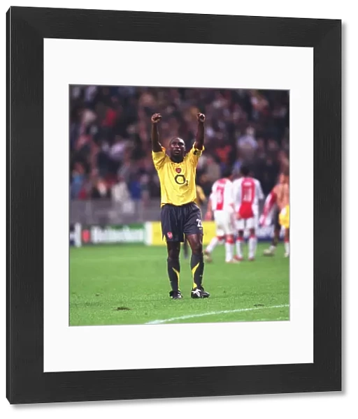 Arsenal captain Sol Campbell celebrates after the match
