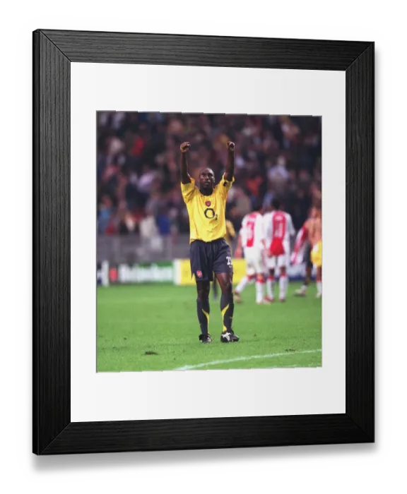 Framed Print : Arsenal captain Sol Campbell celebrates after the match Framed Print : Arsenal captain Sol Campbell celebrates after the match