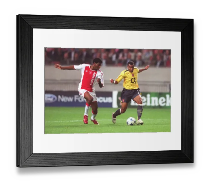 Framed Print : Ashley Cole (Arsenal) Ryan Babel (Ajax) Framed Print : Ashley Cole (Arsenal) Ryan Babel (Ajax)