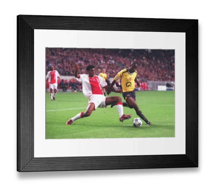 Framed Print : Lauren (Arsenal) Ryan Babel (Ajax) Framed Print : Lauren (Arsenal) Ryan Babel (Ajax)