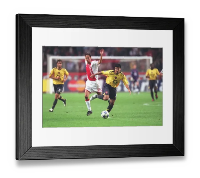 Framed Print : Jose Reyes (Arsenal) Olaf Lindenbergh (Ajax) Framed Print : Jose Reyes (Arsenal) Olaf Lindenbergh (Ajax)