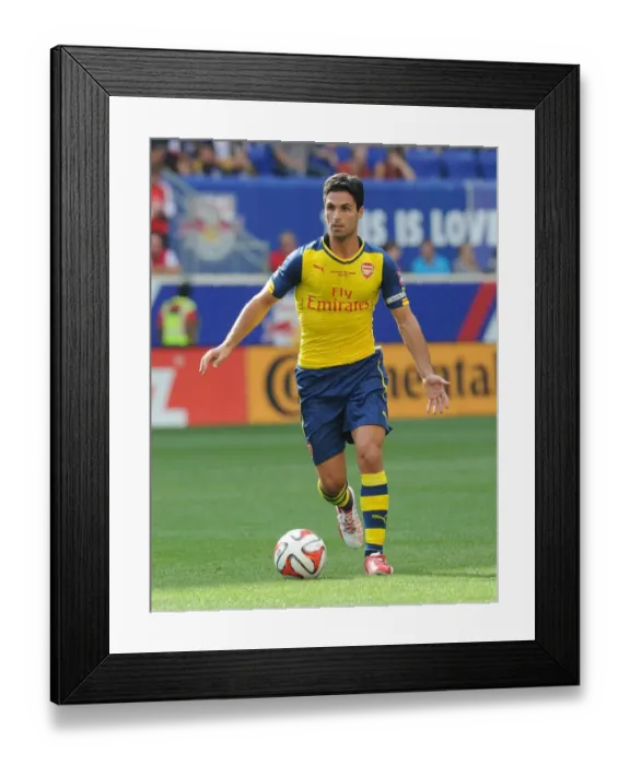 Framed Print : Mikel Arteta Leads Arsenal in Pre-Season Clash Against New York Red Bulls (2014-15)