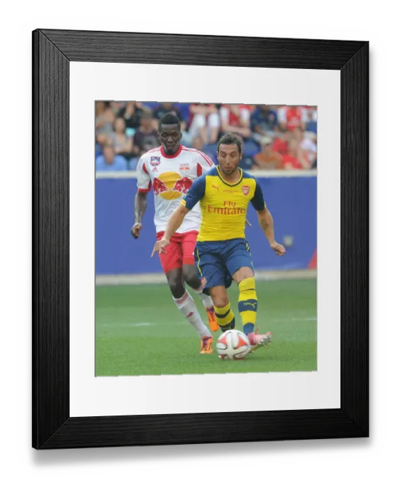 Framed Print : Clash of Stars: Santi Cazorla vs. Ambroise Oyongo - Arsenal vs. New York Red Bulls (2014) Framed Print : Clash of Stars: Santi Cazorla vs. Ambroise Oyongo - Arsenal vs. New York Red Bulls (2014)