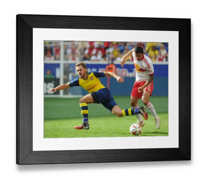 Framed Print : Ramsey vs. Cahill: Clash of the Titans - Arsenal vs. New York Red Bulls Pre-Season