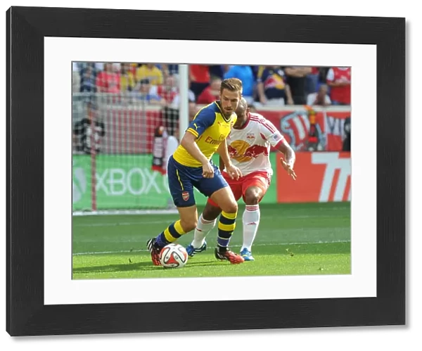 Arsenal's Aaron Ramsey Fends Off Jamison Olave in 2014 Pre-Season Clash