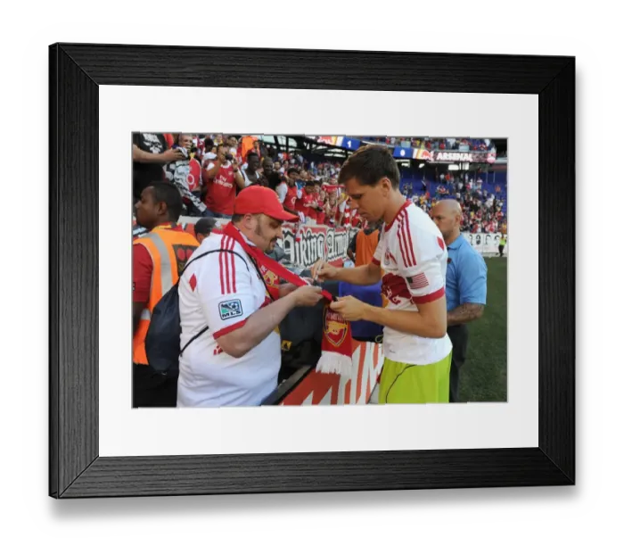 Framed Print : Wojciech Szczesny Signs Autographs for Fans after Arsenal's Pre-Season Match vs. New York Red Bulls Framed Print : Wojciech Szczesny Signs Autographs for Fans after Arsenal's Pre-Season Match vs. New York Red Bulls