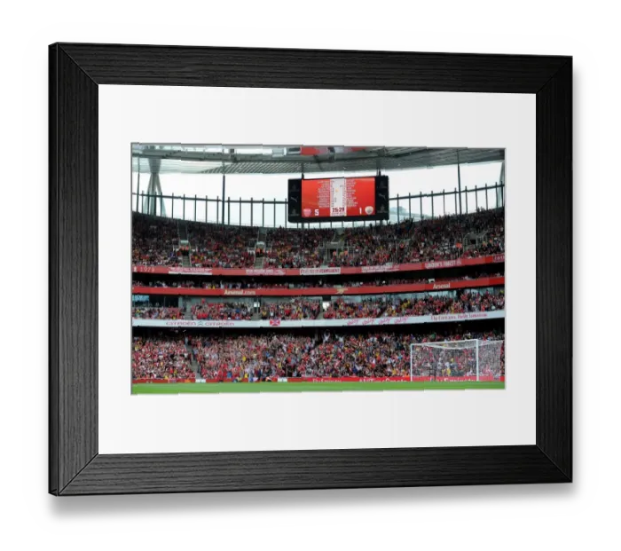 Framed Print : Arsenal fans do a mexican wave. Arsenal 5: 1 Benfica. The Emirates Cup, Day 1. Emirates Stadium
