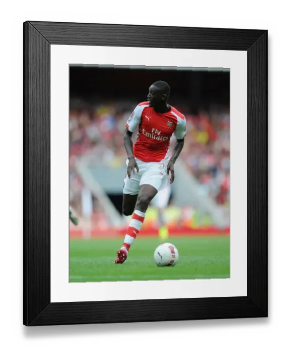 Framed Print : Yaya Sanogo in Action: Arsenal vs Benfica, Emirates Cup 2014 Framed Print : Yaya Sanogo in Action: Arsenal vs Benfica, Emirates Cup 2014