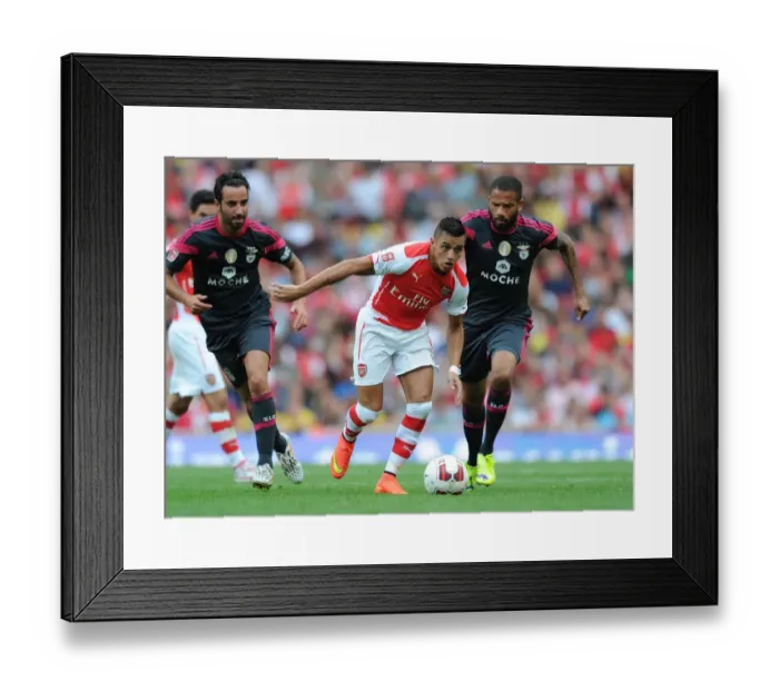 Framed Print : Arsenal's Alexis Sanchez Outmaneuvers Benfica's Ruben Amorim during the Emirates Cup Clash Framed Print : Arsenal's Alexis Sanchez Outmaneuvers Benfica's Ruben Amorim during the Emirates Cup Clash