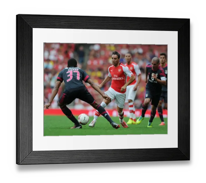 Framed Print : Clash of Midfield Maestros: Cazorla vs Cesar at the Emirates Cup